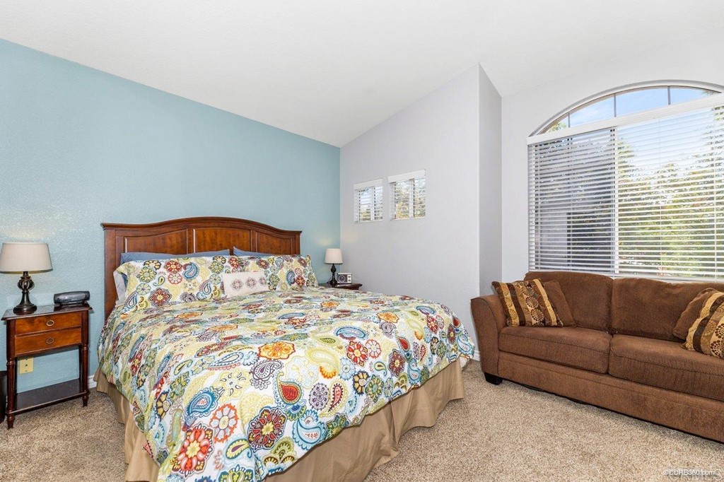 1840 Century Way Escondido, CA 92026 - Photo 21 of 36 a bedroom with a bed couch and window
