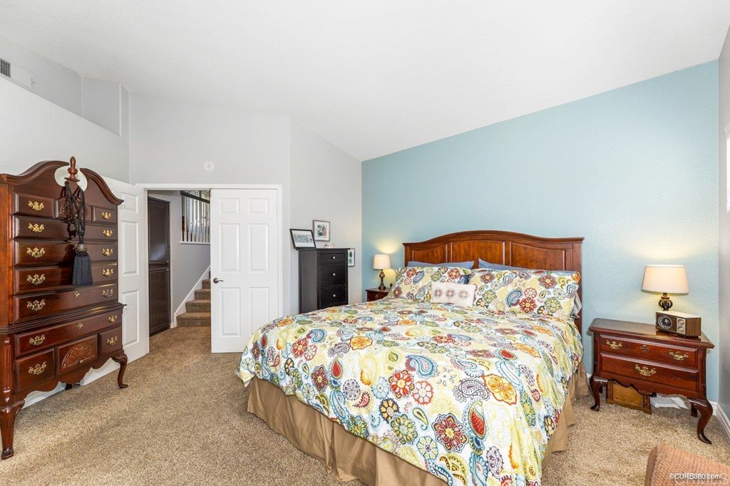 1840 Century Way Escondido, CA 92026 - Photo 22 of 36 a bedroom with a bed and dresser