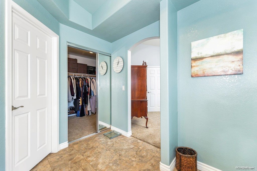 1840 Century Way Escondido, CA 92026 - Photo 26 of 36 a view of a hallway with closet and a window