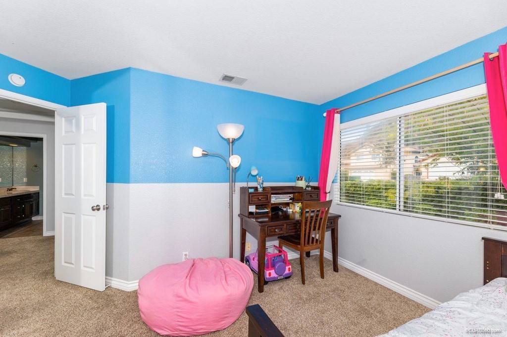 1840 Century Way Escondido, CA 92026 - Photo 28 of 36 a view of a workspace with furniture and a window