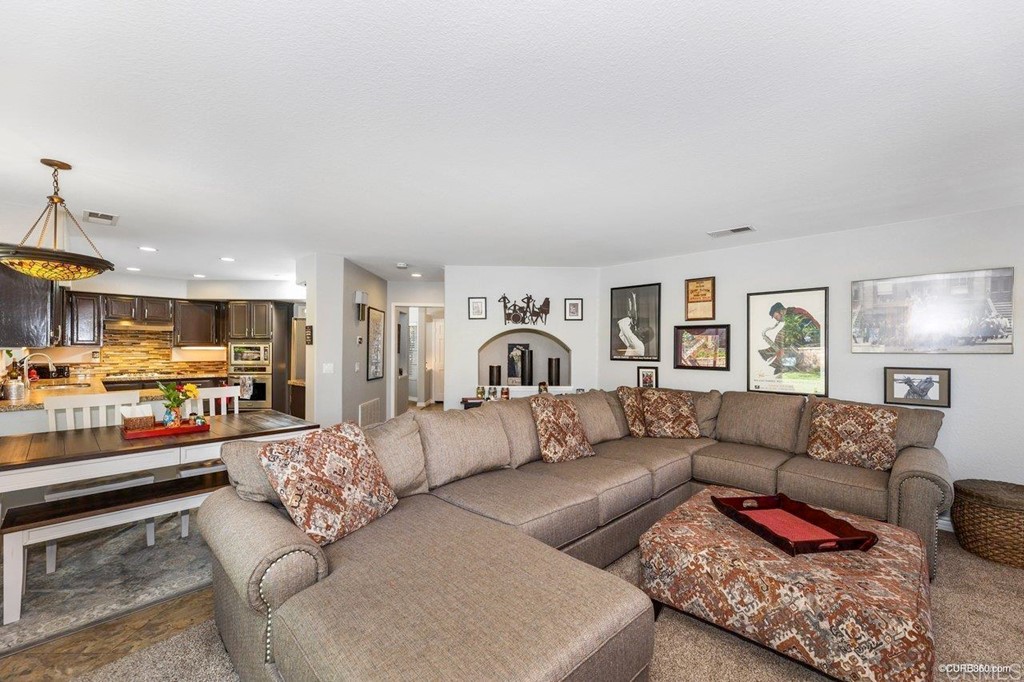 1840 Century Way Escondido, CA 92026 - Photo 3 of 36 a living room with furniture and a couch