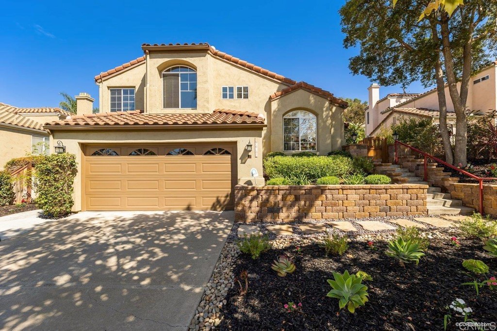 1840 Century Way Escondido, CA 92026 - Photo 35 of 36 a front view of a house with a yard