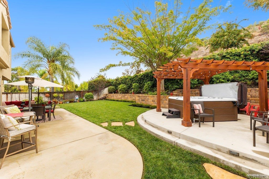 1840 Century Way Escondido, CA 92026 - Photo 6 of 36 a view of a backyard with sitting area