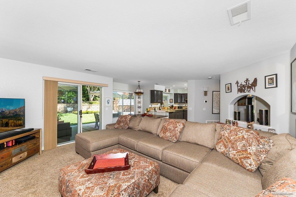 1840 Century Way Escondido, CA 92026 - Photo 10 of 36 a view of a livingroom with furniture and a flat screen tv