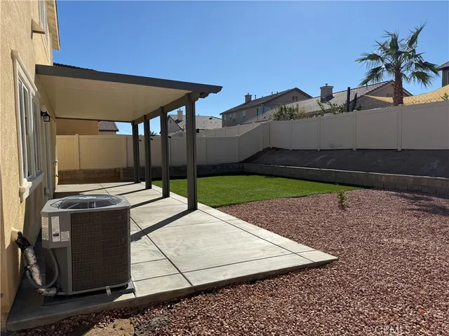 a view of a backyard with plants