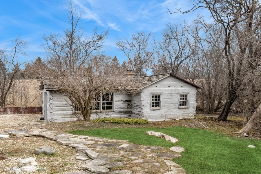 401 Lee Road Northbrook, IL 60062 - Photo 12 of 15 a front view of house with yard and trees