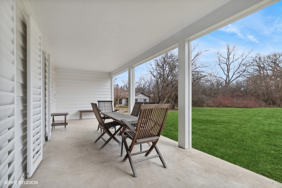 401 Lee Road Northbrook, IL 60062 - Photo 2 of 15 a view of a porch with chairs and backyard