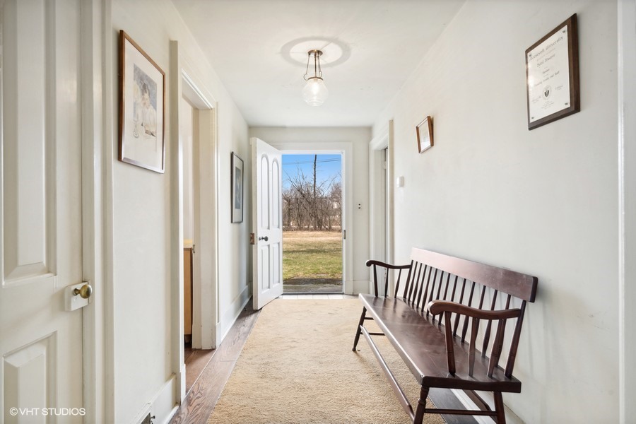 401 Lee Road Northbrook, IL 60062 - Photo 4 of 15 a view of a hallway with a bedroom