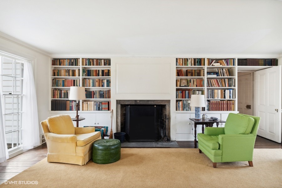 401 Lee Road Northbrook, IL 60062 - Photo 5 of 15 a living room with furniture and a fireplace