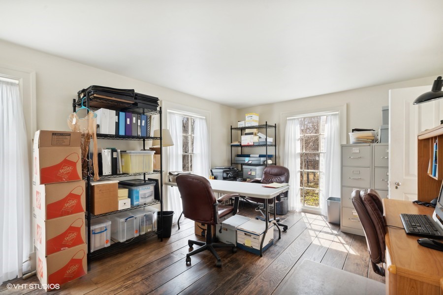 401 Lee Road Northbrook, IL 60062 - Photo 8 of 15 a view of a livingroom with workspace and a window