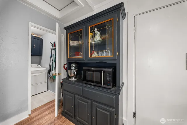 a kitchen with a stove and a microwave