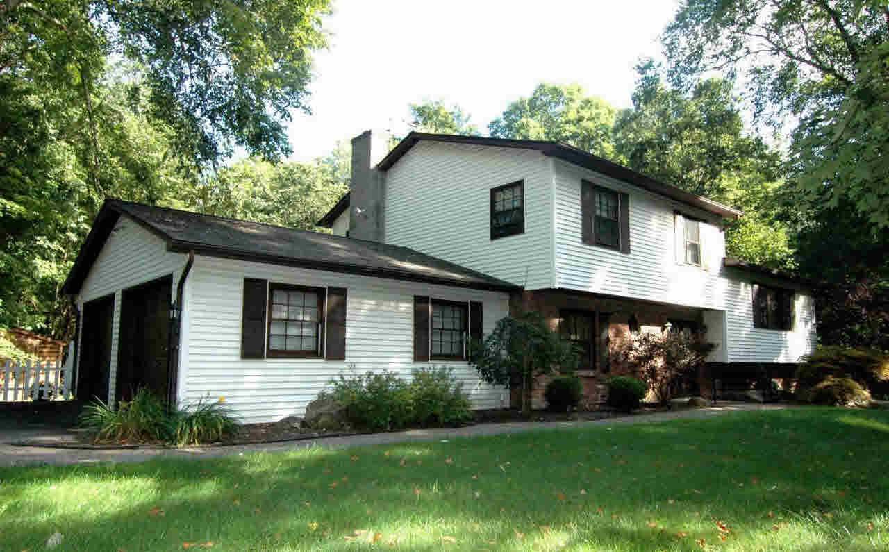 a house view with a garden space