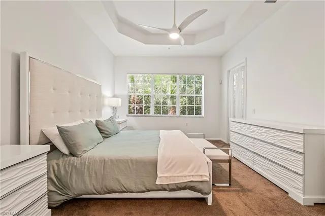 a bathroom with a shower sink and mirror