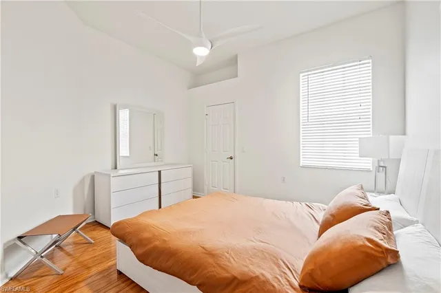 an aerial view of a swimming pool patio and outdoor seating