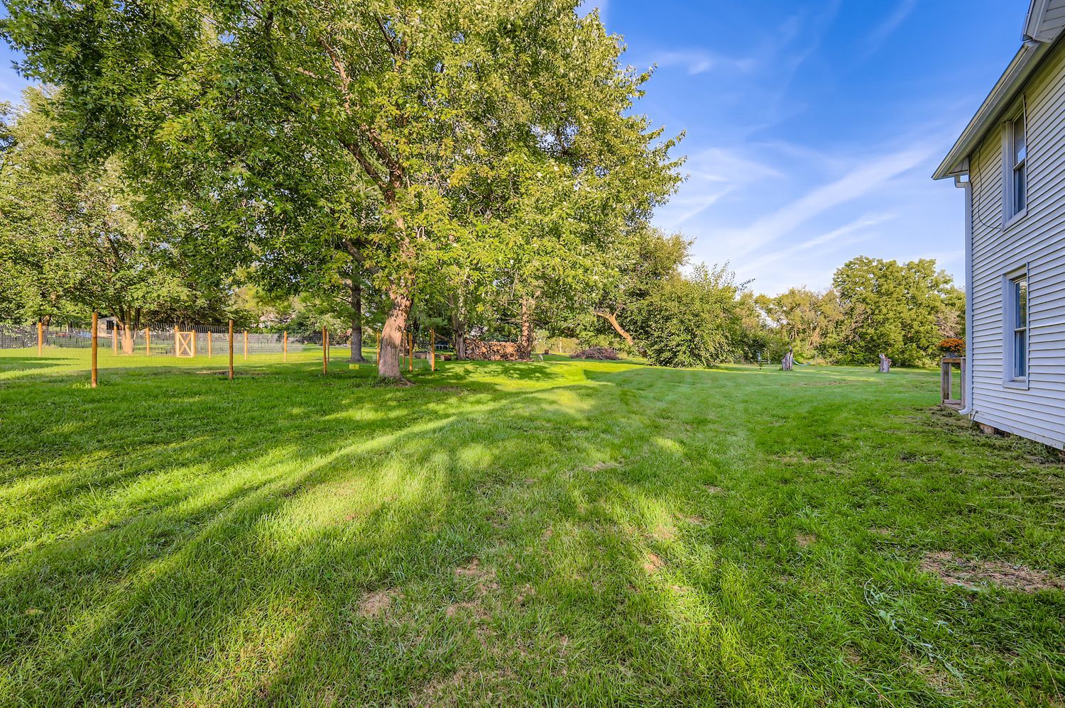 5N460 Hanson Road St. Charles, IL 60175 - Photo 24 of 24 a view of a grassy field with trees