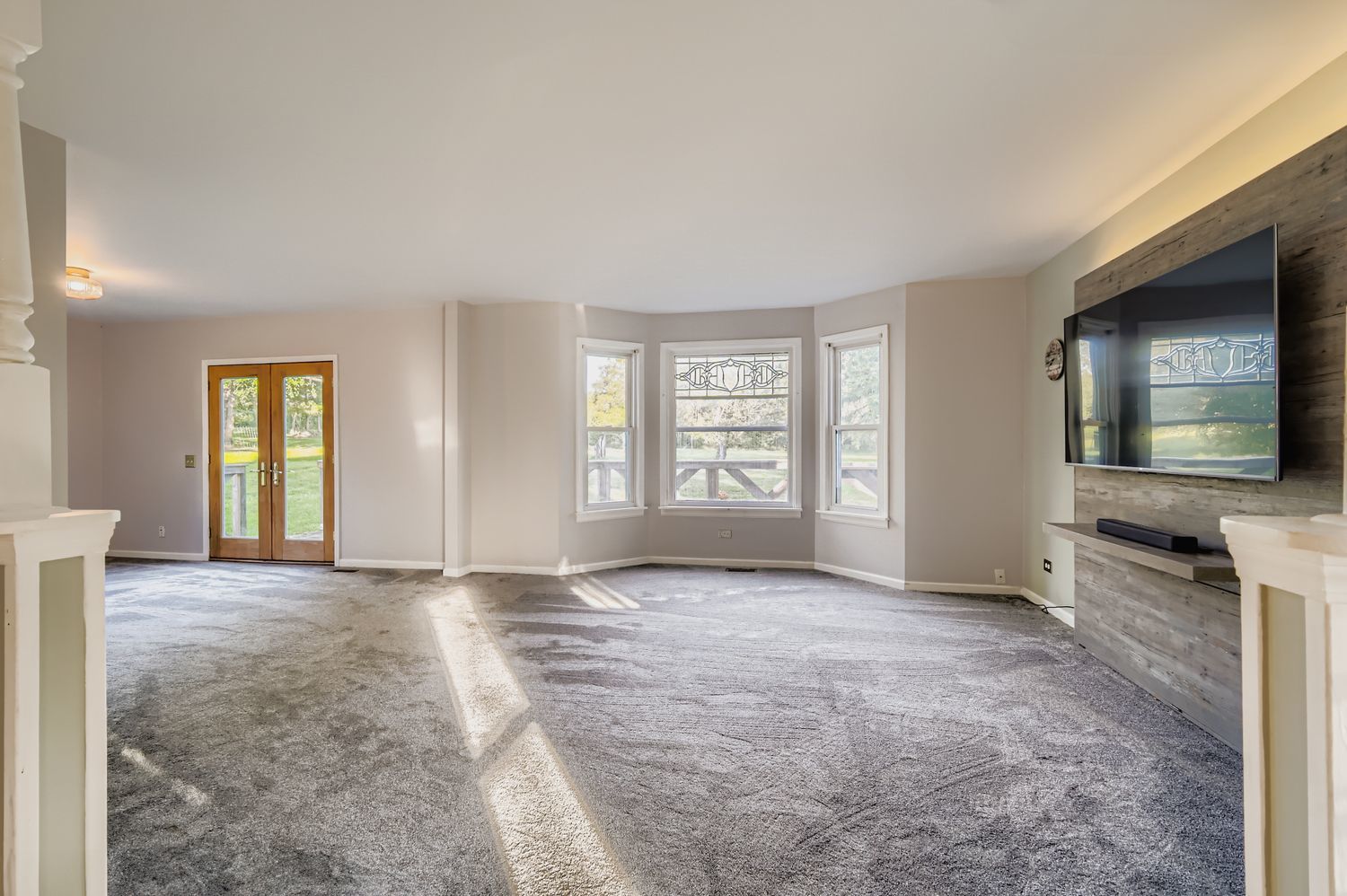5N460 Hanson Road St. Charles, IL 60175 - Photo 4 of 24 a view of an empty room with a window and a kitchen