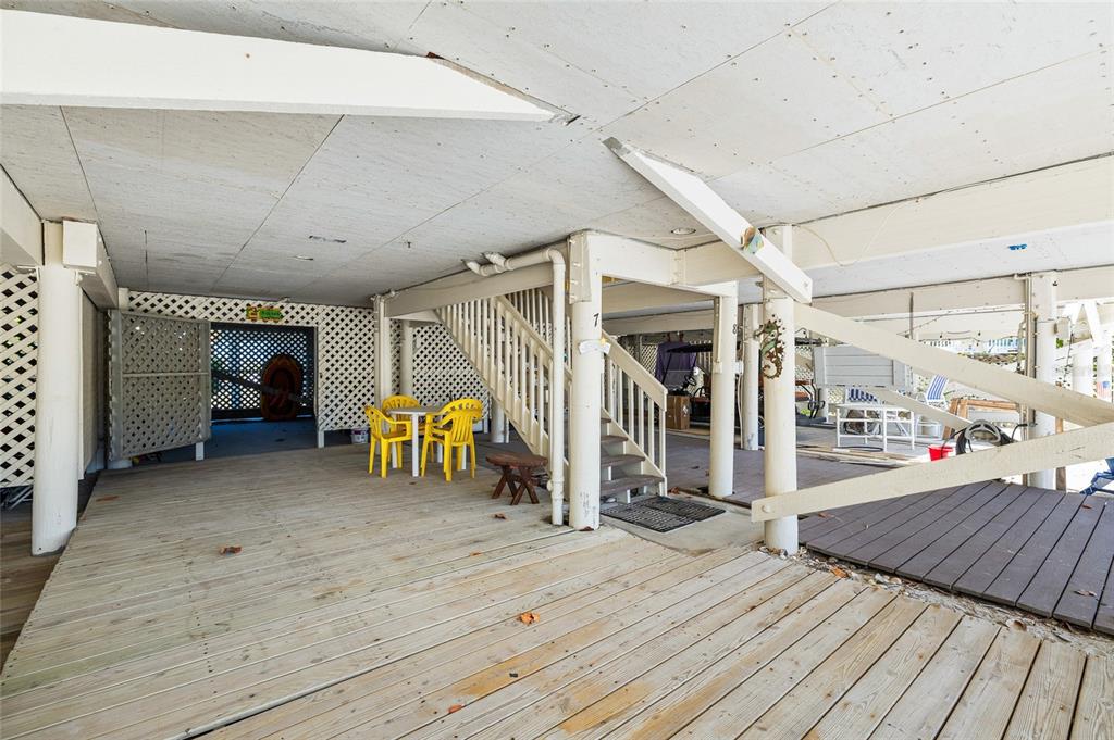 9400 Little Gasparilla, Unit F7 Placida, FL 33946 - Photo 25 of 39 a view of a room with wooden floor