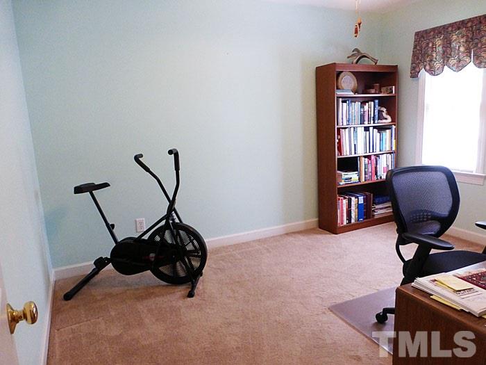 4807 Sinclair Drive Raleigh, NC 27616 - Photo 15 of 25 a room with furniture and gym equipment
