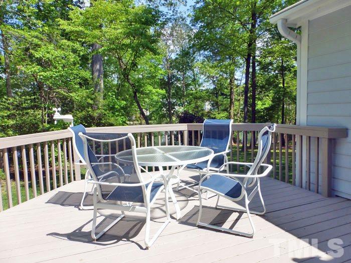 4807 Sinclair Drive Raleigh, NC 27616 - Photo 21 of 25 a view of a patio with a table and chairs
