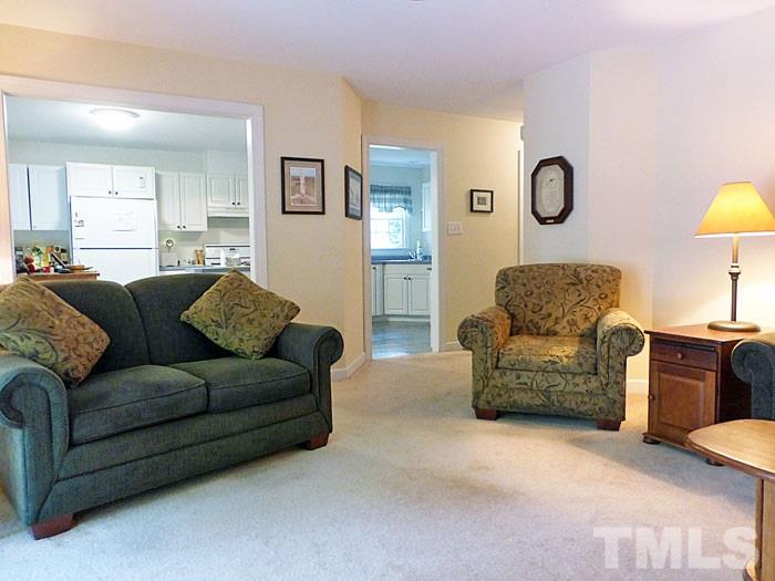 4807 Sinclair Drive Raleigh, NC 27616 - Photo 4 of 25 a living room with furniture and a couch
