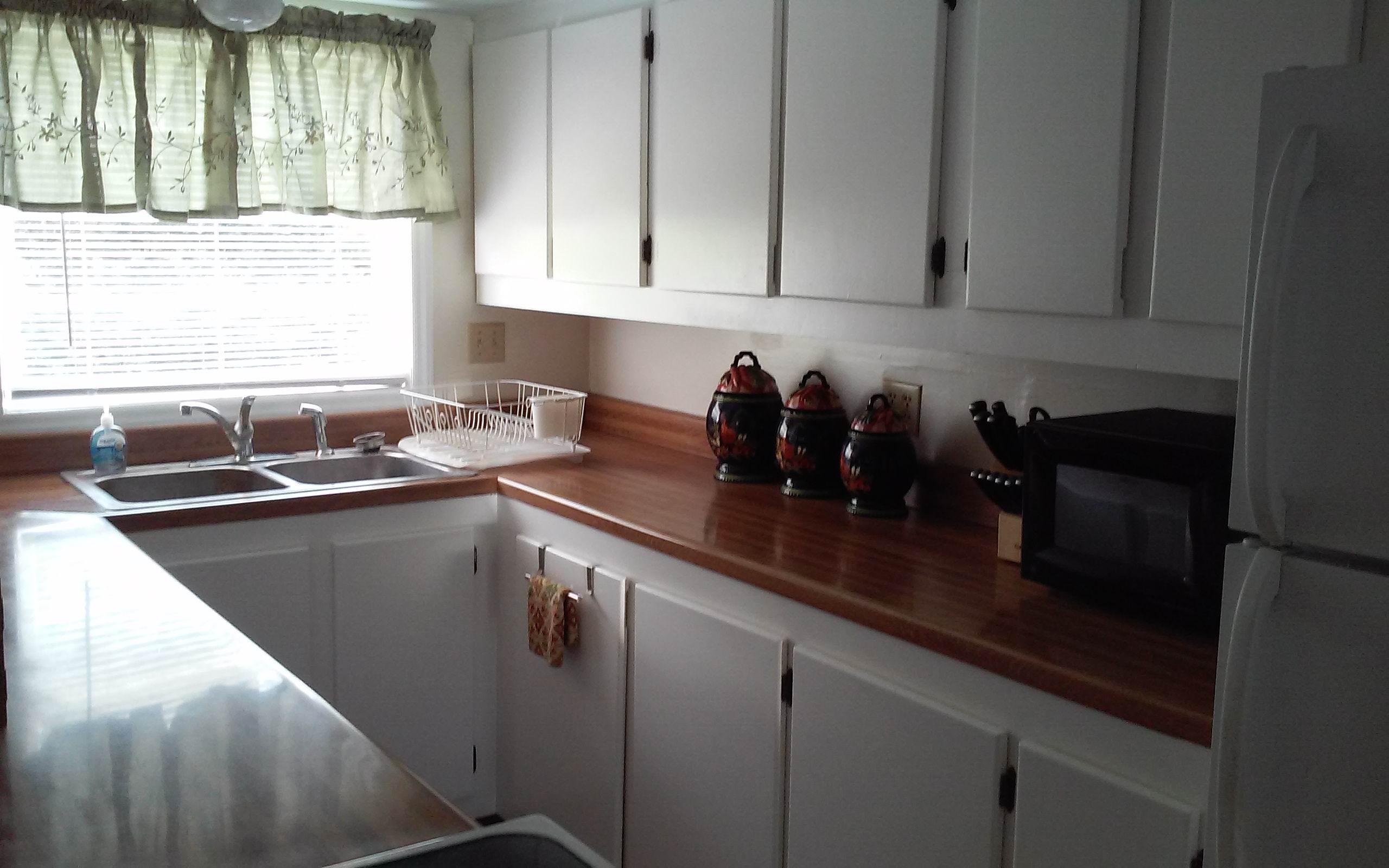1990 Reesedale Road Elliston, VA 24087 - Photo 12 of 24 a kitchen with a sink and cabinets
