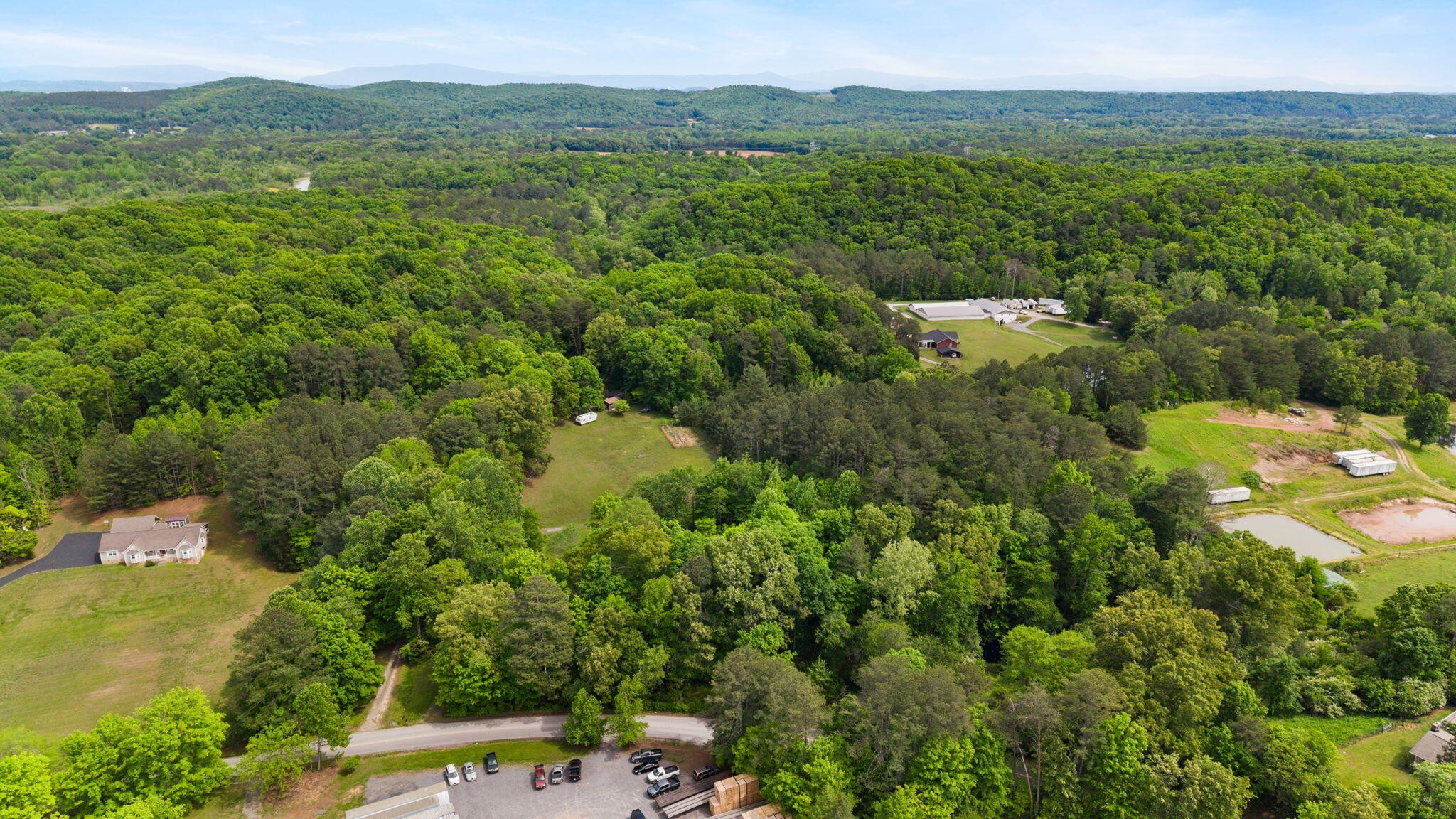 3414 No Pone Road Northwest Georgetown, TN 37336 - Photo 10 of 30 a view of a city with lush green forest