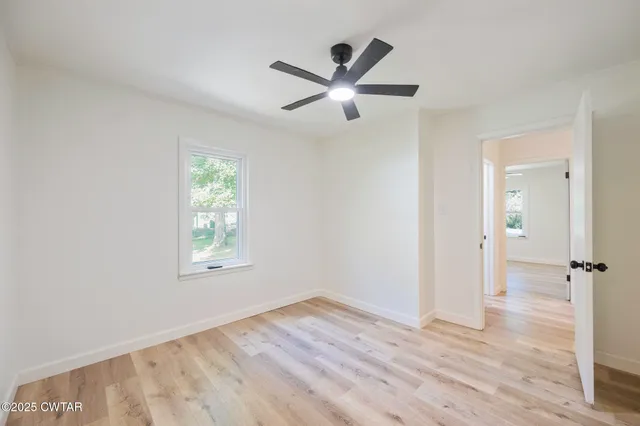 a bathroom with a double vanity sink and mirror
