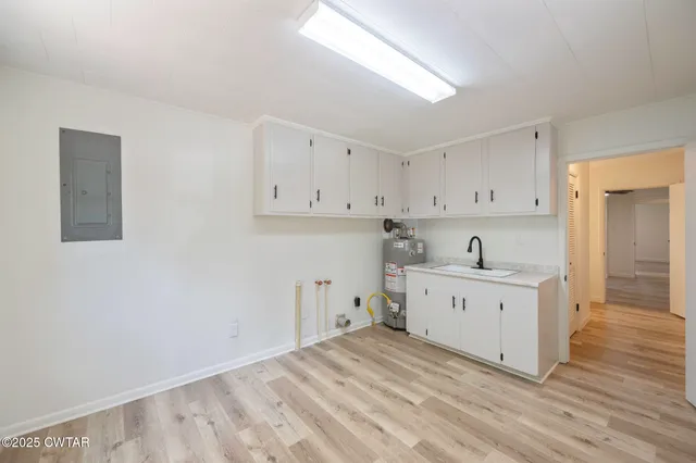 a room with a bed and a window