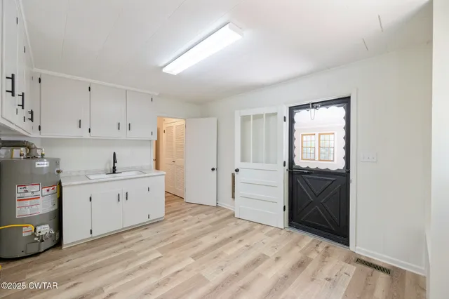 a front view of a house with a garage