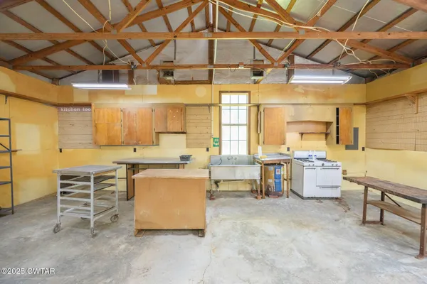 a view of a chairs and table on the terrace