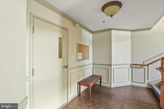 a room with a table and chairs