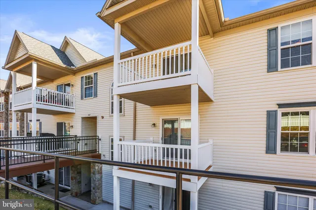 front view of a house with a deck