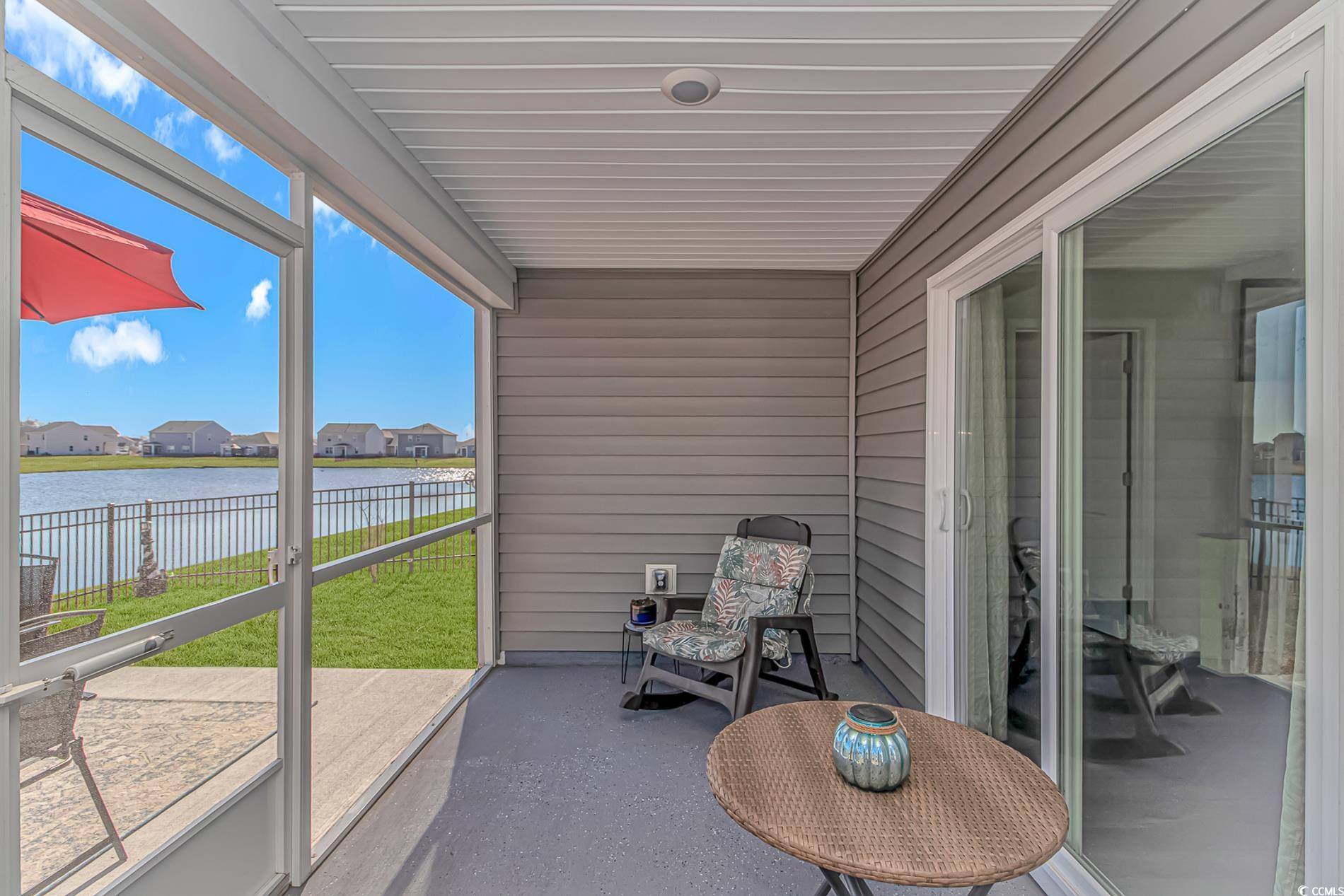 559 Courtridge Loop Conway, SC 29526 - Photo 20 of 37 Sunroom featuring a water view