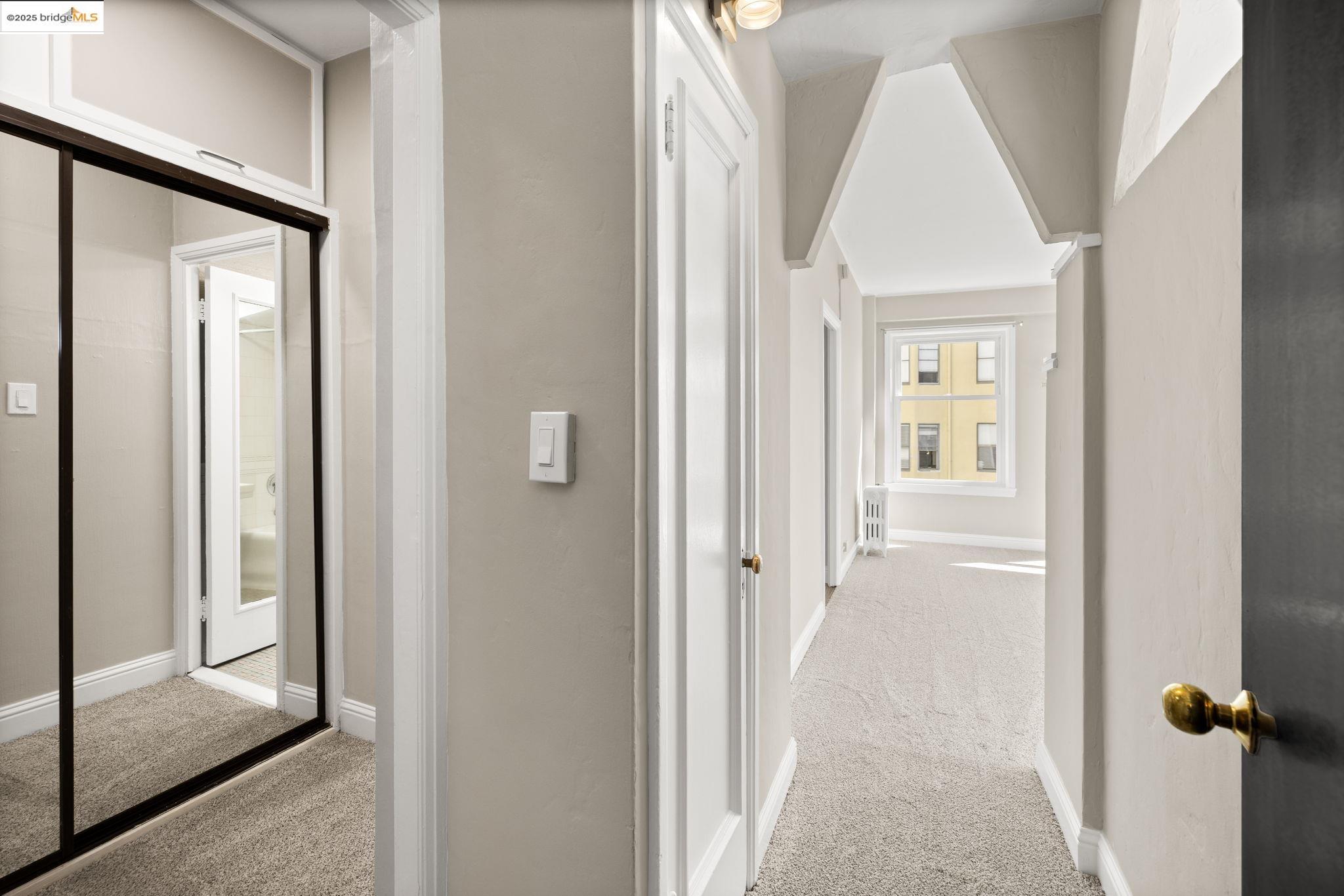 631 O'Farrell Street, Unit 416 San Francisco, CA 94109 - Photo 13 of 30 a view of a livingroom from a hallway