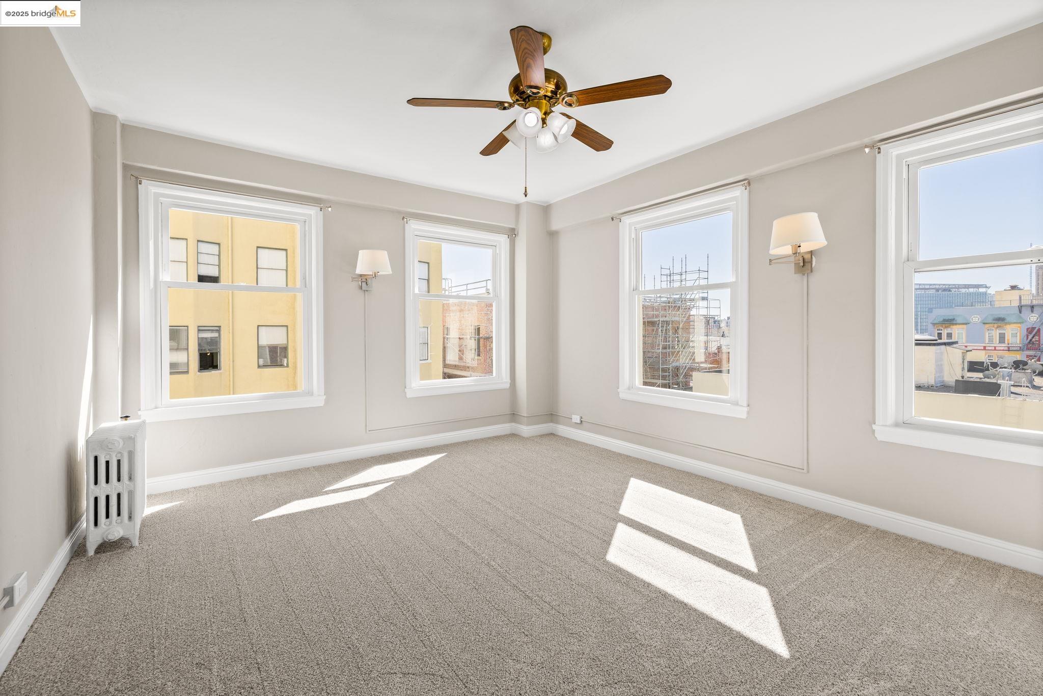 631 O'Farrell Street, Unit 416 San Francisco, CA 94109 - Photo 14 of 30 a view of an empty room with a window