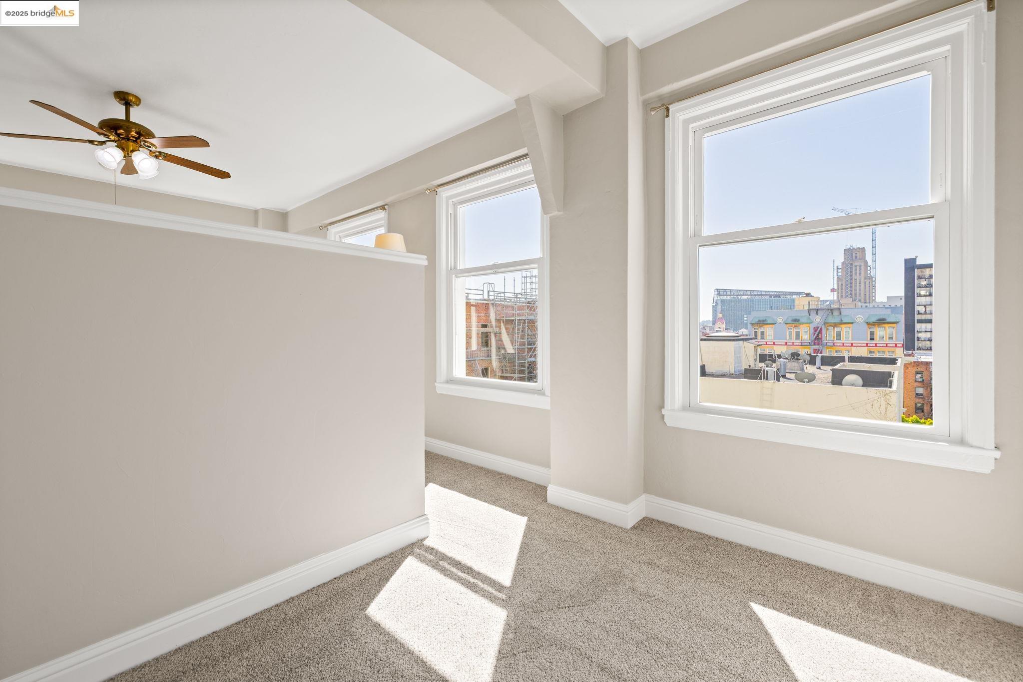 631 O'Farrell Street, Unit 416 San Francisco, CA 94109 - Photo 22 of 30 a view of an empty room with a window