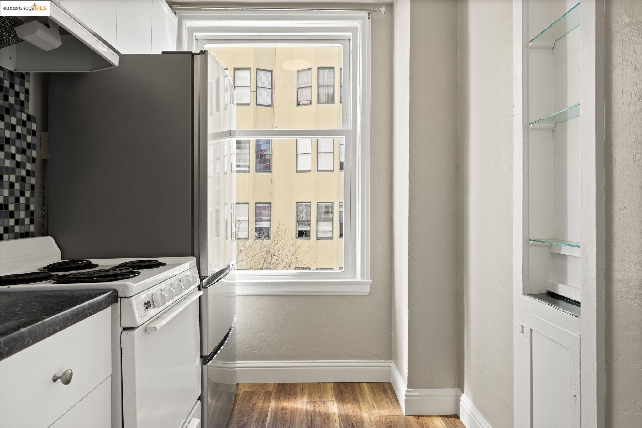 631 O'Farrell Street, Unit 416 San Francisco, CA 94109 - Photo 24 of 30 a utility room with dryer and washer