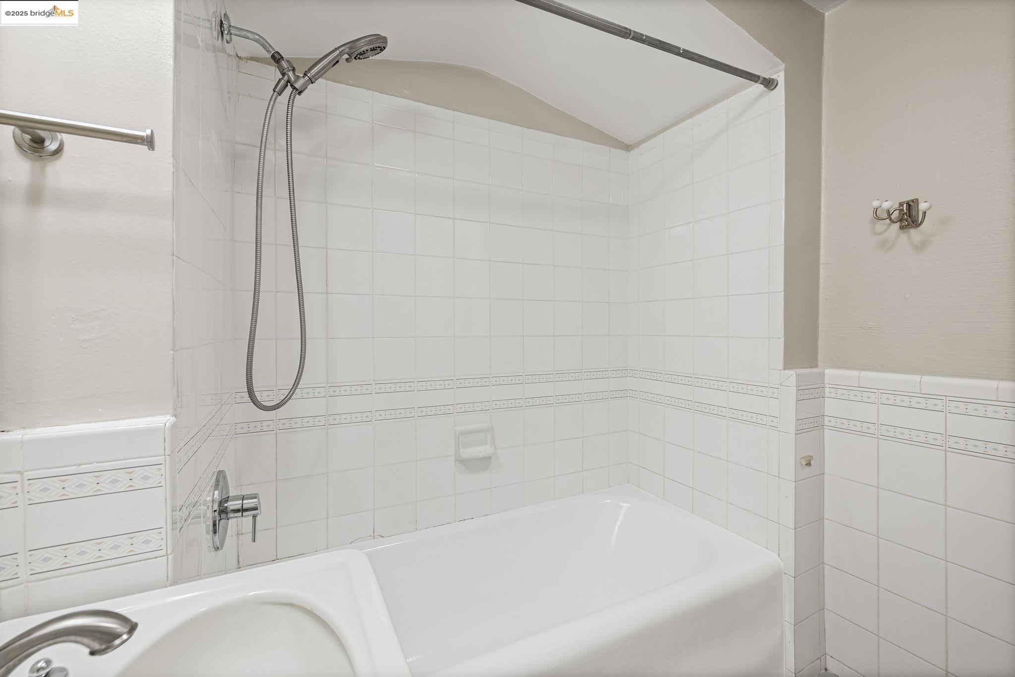 631 O'Farrell Street, Unit 416 San Francisco, CA 94109 - Photo 30 of 30 a bathroom with a bathtub and a shower