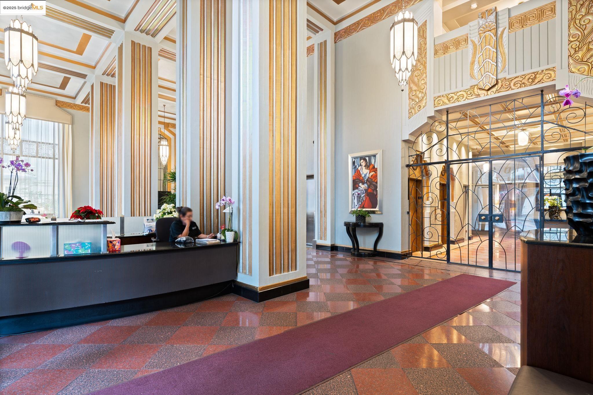 631 O'Farrell Street, Unit 416 San Francisco, CA 94109 - Photo 3 of 30 a living room with furniture and a large window