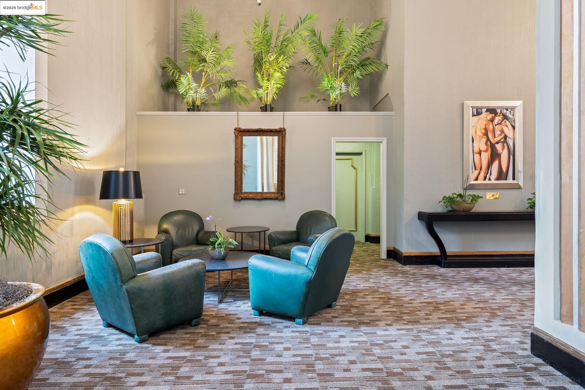 631 O'Farrell Street, Unit 416 San Francisco, CA 94109 - Photo 7 of 30 a living room with furniture and a potted plant