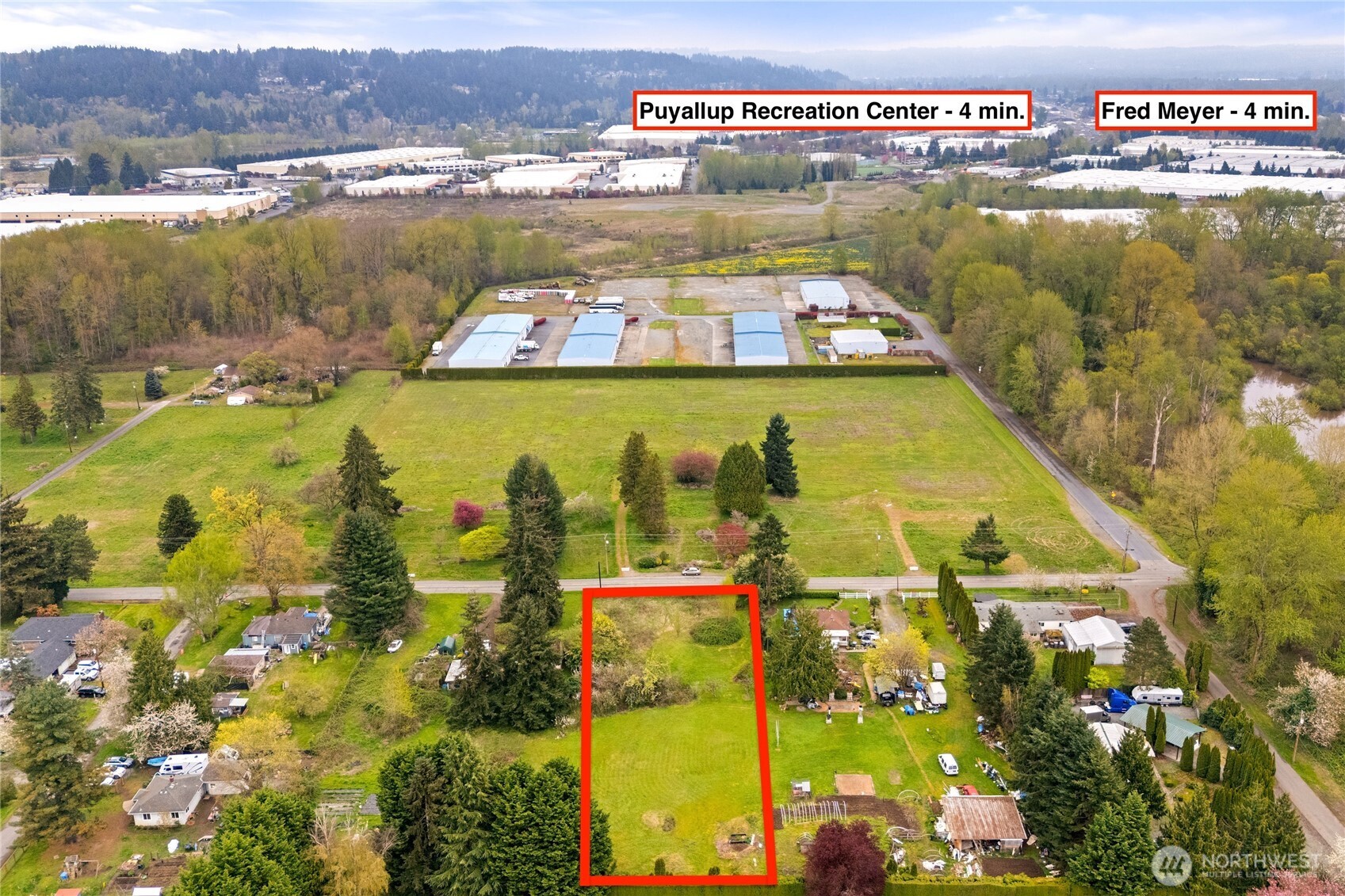 5106 Freeman Road East Fife, WA 98424 - Photo 10 of 13 a view of a swimming pool with an ocean view