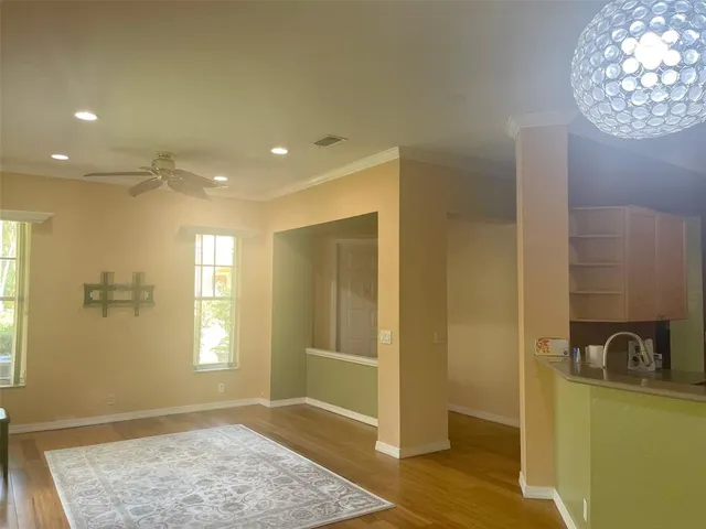 a view of entryway with wooden floor