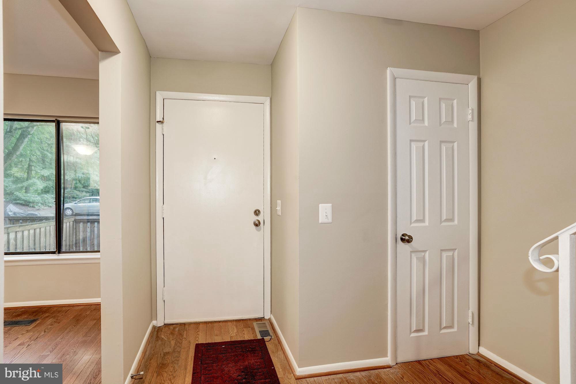 11704 Decade Court Reston, VA 20191 - Photo 2 of 30 a view of front door with wooden floor