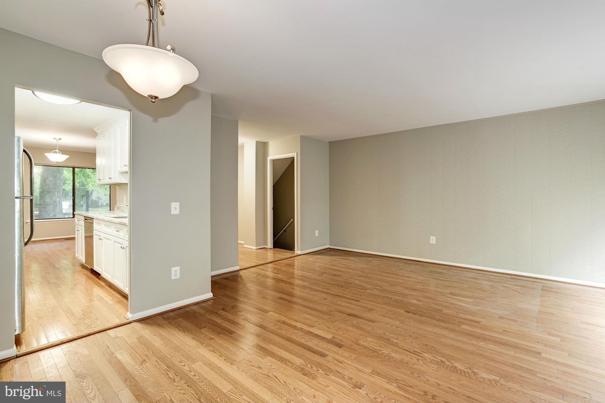 11704 Decade Court Reston, VA 20191 - Photo 12 of 30 a view of an empty room with wooden floor
