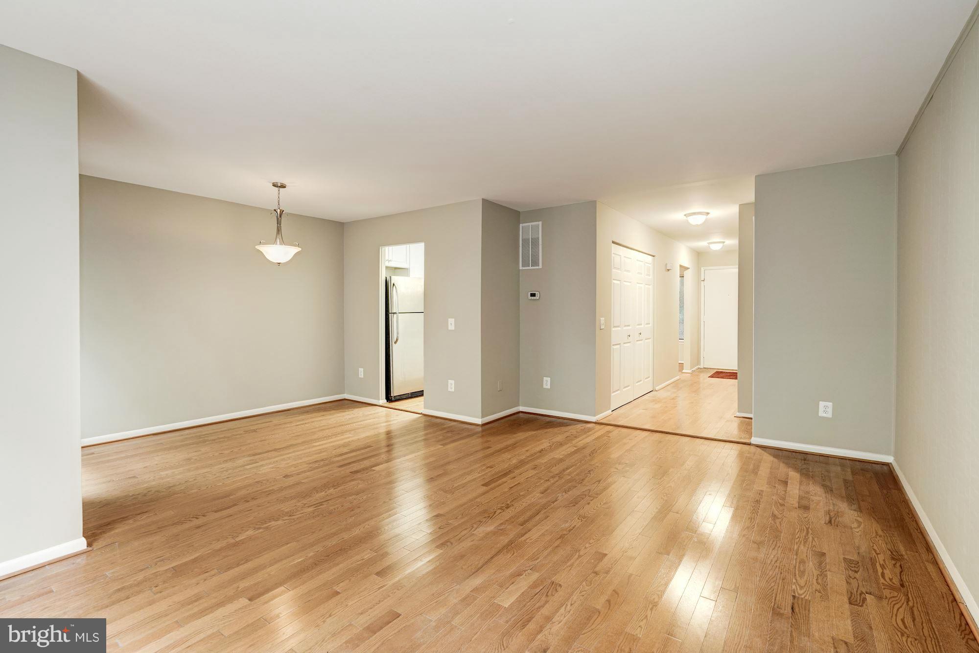 11704 Decade Court Reston, VA 20191 - Photo 15 of 30 a view of an empty room and wooden floor