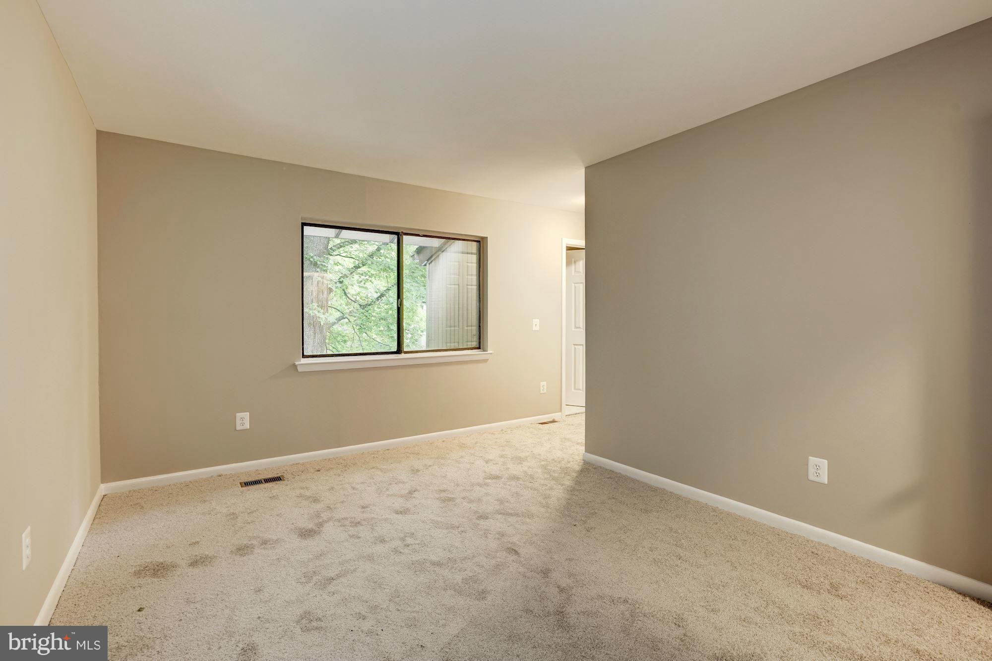 11704 Decade Court Reston, VA 20191 - Photo 18 of 30 an empty room with windows and closet