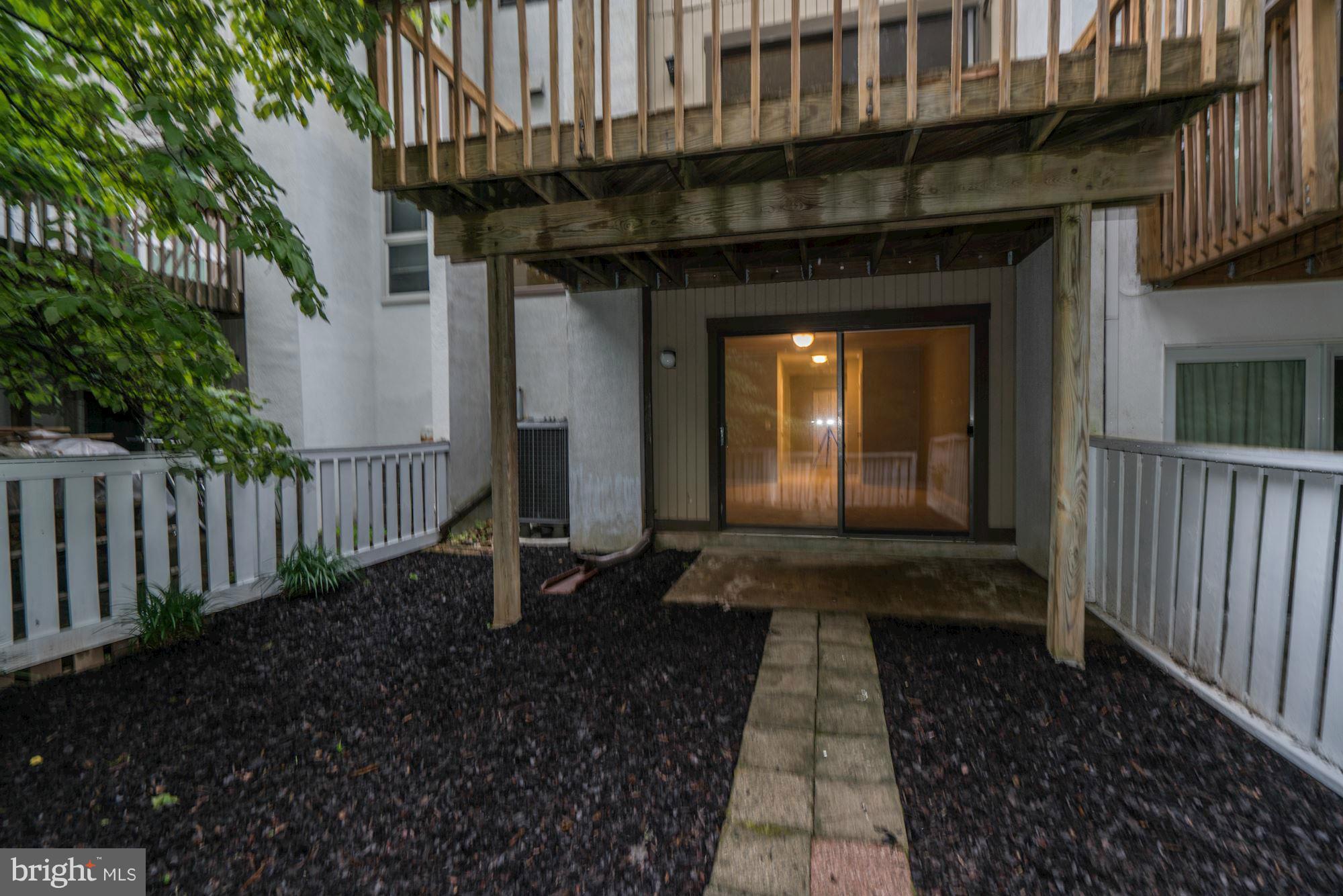 11704 Decade Court Reston, VA 20191 - Photo 28 of 30 a front view of a house with a yard