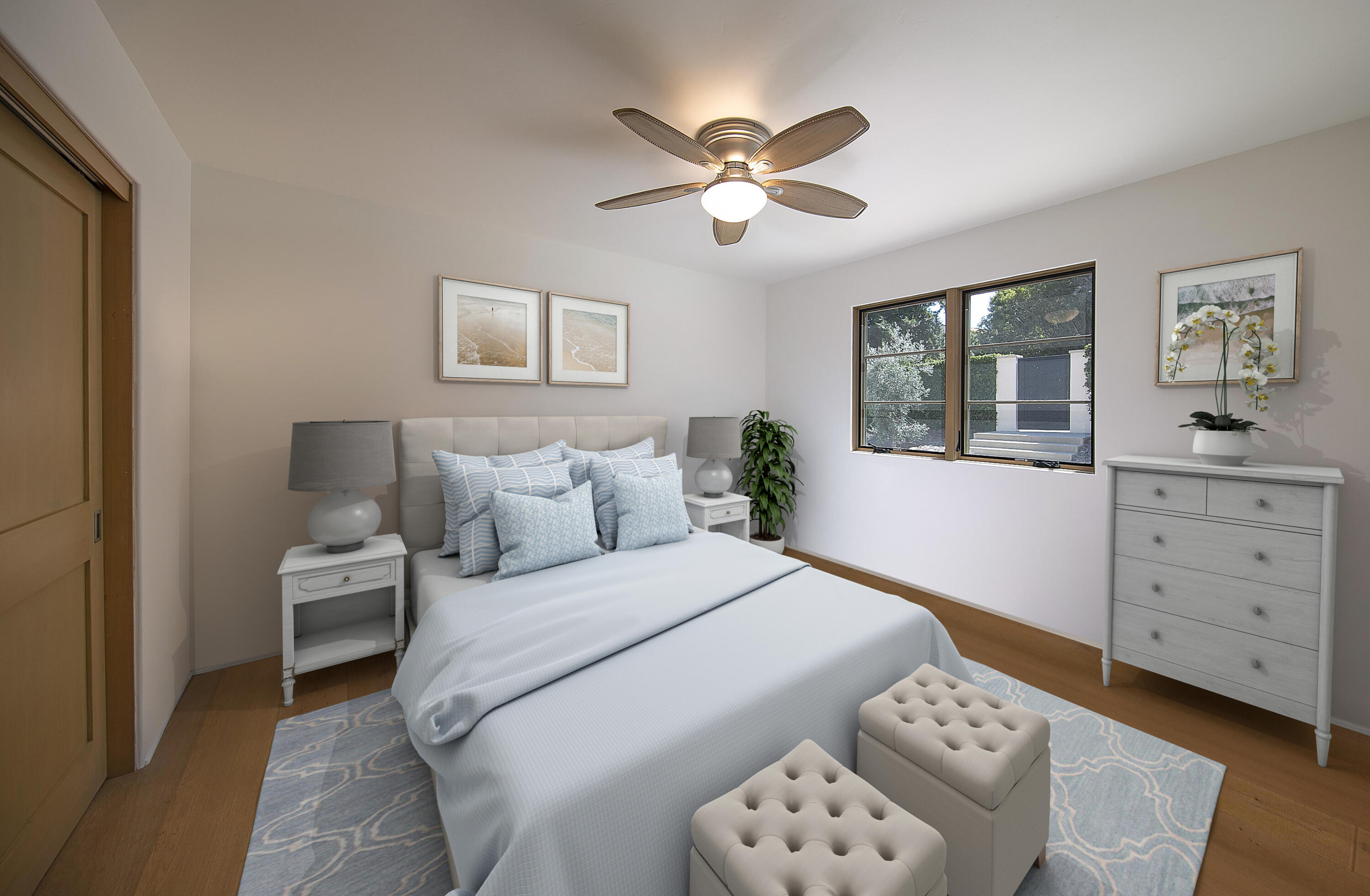 7305 Shepard Mesa Drive Carpinteria, CA 93013 - Photo 11 of 26 a bedroom with a bed and a chandelier