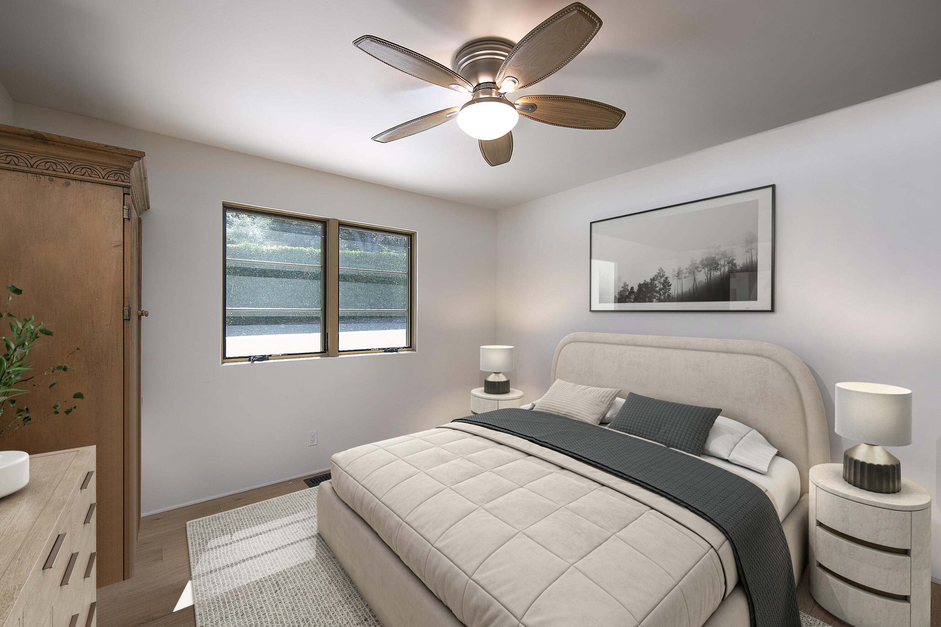 7305 Shepard Mesa Drive Carpinteria, CA 93013 - Photo 10 of 26 a bedroom with a large bed and a chandelier