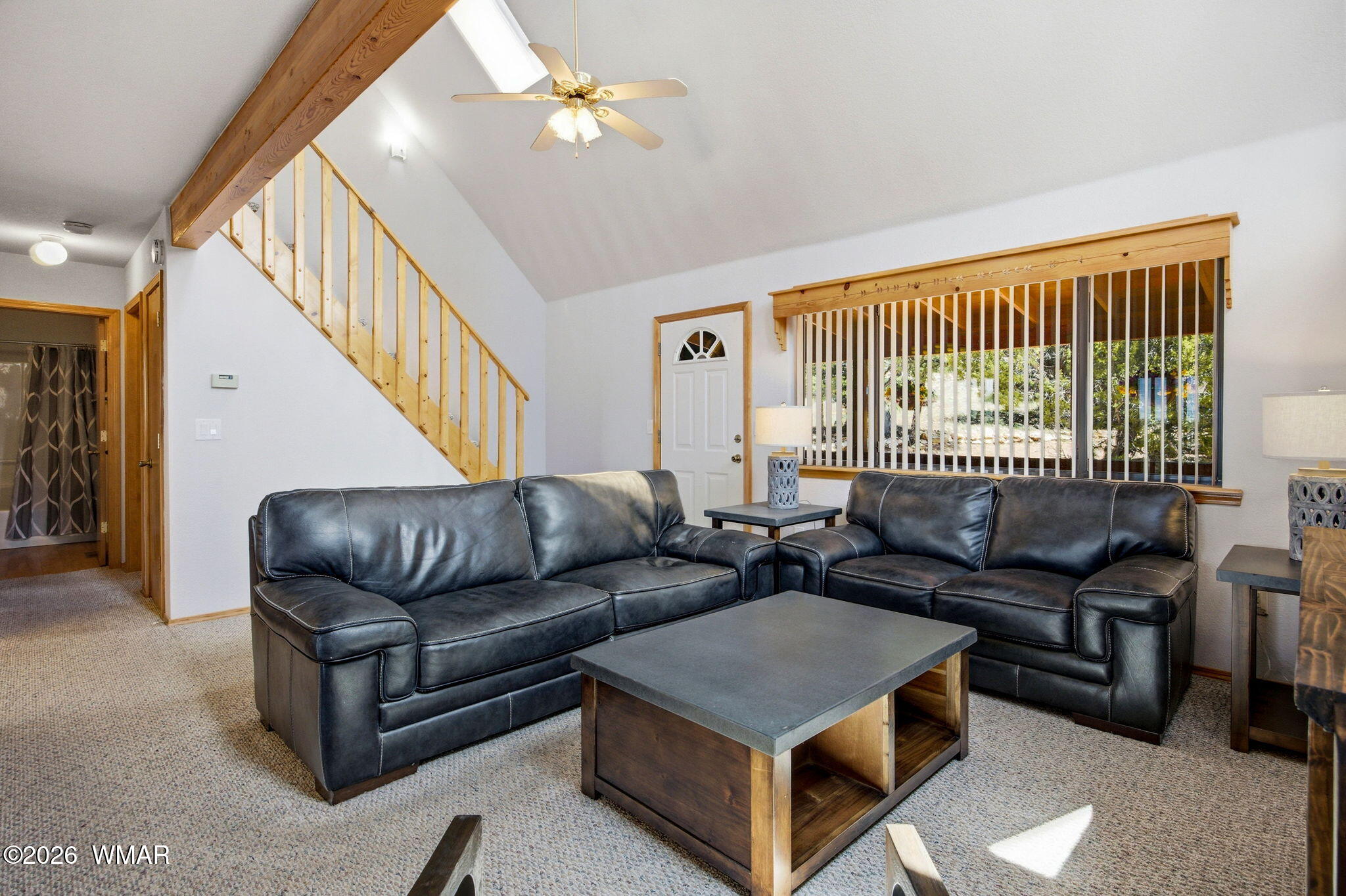2806 Sky Hawk Drive Overgaard, AZ 85933 - Photo 10 of 43 a living room with furniture and a large window